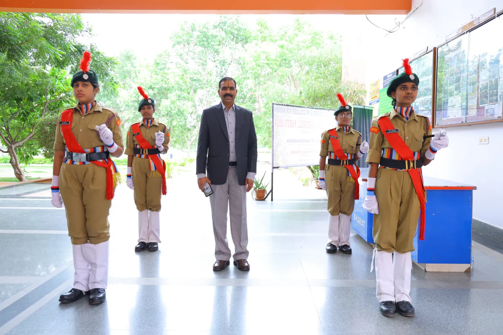 NCC cadets welcoming dignitaries at the college entrance