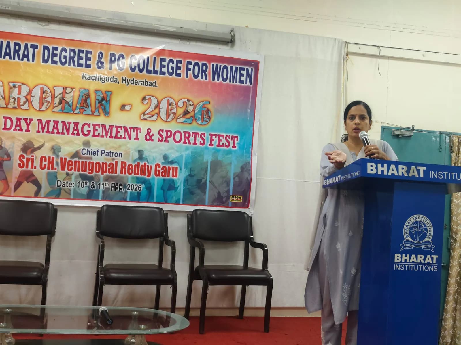 Faculty addressing students at an academic and sports event
